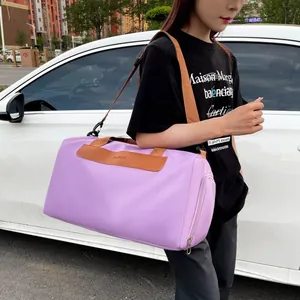 Detailed view of purple multi-functional fitness bag with wet-dry separation pocket