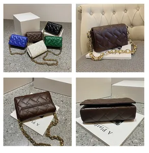Close-up of quilted leather crossbody bags with chunky gold chain in multiple colors
