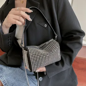 Fashion silver studded cylindrical bag with chain strap and black leather handles