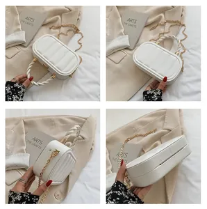 Detail view of white quilted handbag with woven handle and gold chain strap