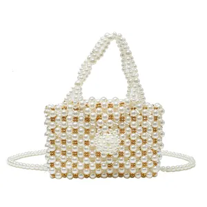 Handmade woven pearl handbag with gold beads and floral clasp for women