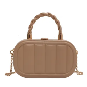 Elegant beige vertical-stitched capsule handbag with gold chain and woven handle