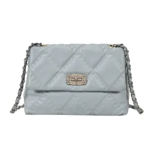 Light blue quilted chain shoulder bag with diamond-encrusted twist lock for women