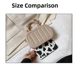 Size comparison of a beige quilted mini handbag next to a smartphone with a gold chain