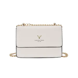 Minimalist ivory PU leather crossbody bag with gold chain and metal deer head logo accent