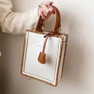 Retro cream and brown contrast tote bag with hand-woven edges and chain strap
