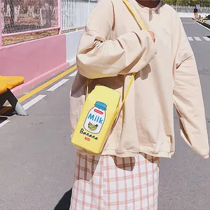 Creative yellow banana milk carton shaped crossbody bag with adjustable strap and 750ml print