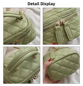 Detail view of light green quilted mini bag showing stitching and golden hardware