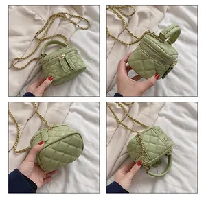 Multi-angle views of a mini light green quilted box bag with gold chain and dual zippers