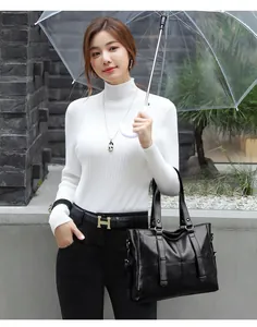 Detailed view of the large black soft leather tote bag for women showing spacious interior
