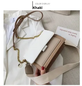 Khaki and beige colorblock crossbody bag with metal chain and wide fabric strap