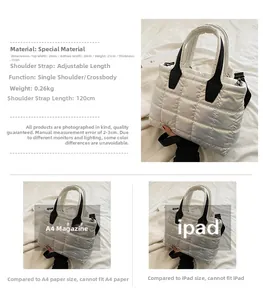 Detail of white quilted down tote bag showing size specs and adjustable shoulder strap