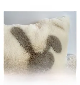 Close-up of fluffy faux fur texture and cute rabbit pattern on the plush tote bag
