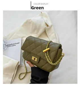 Detail of olive green quilted shoulder bag with gold twist lock and chain strap