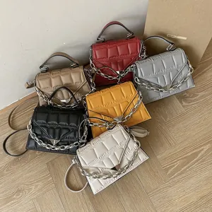 Detailed display of embossed PU leather bags with metal chains in six various colors