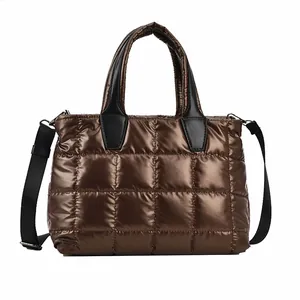 Metallic brown quilted down tote bag with high-shine finish and detachable strap