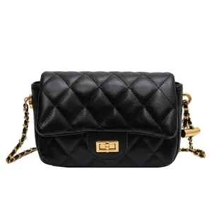 Classic black quilted leather crossbody bag with gold chain strap and turn-lock closure