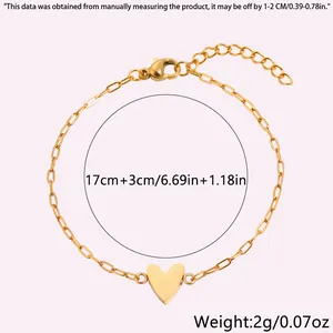 Detailed view of adjustable stainless steel heart pendant and paperclip chain links