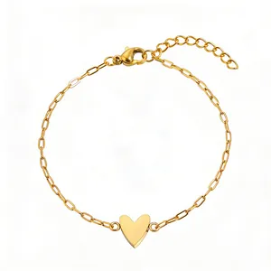 Gold paperclip chain bracelet with hollow heart pendant and adjustable lobster clasp