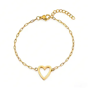 Detail of adjustable gold hollow heart bracelet with lobster clasp and sleek cable chain
