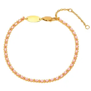 Braided red string bracelet with 18k gold plated beads and oval tag for engraving