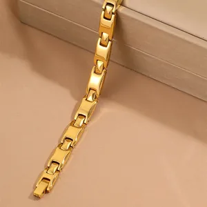 Polished 18k gold plated magnetic stainless steel therapy bracelet for women on display