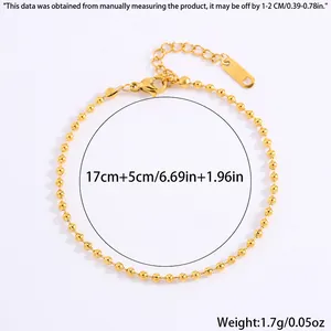 Detail view of golden bead bracelet showing 17cm plus 5cm length and 1.7g weight