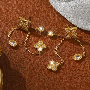 Elegant gold titanium steel clover tassel earrings with sparkling cubic zirconia crystals