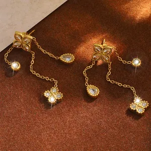Titanium steel clover tassel earrings with sparkling crystals and gold plating