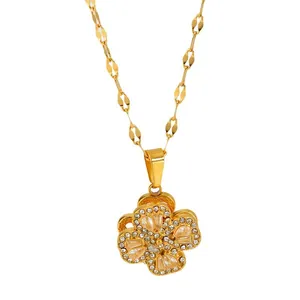 18k gold plated stainless steel rotating clover necklace with crystals on white background
