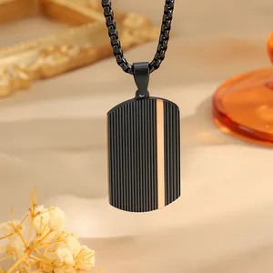 Men's titanium steel dog tag necklace with black stripes and gold accents on satin