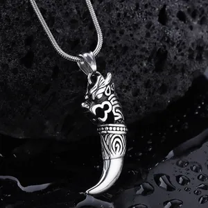 Men's hip hop wolf fang necklace with cross design in silver stainless steel on rock