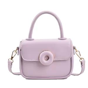 Chic light purple lavender crossbody bag with top handle and gold metal hardware