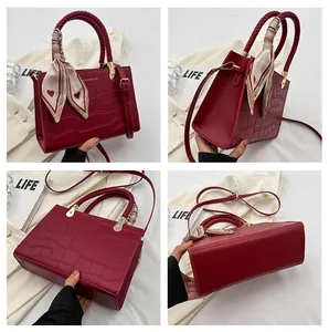 Detailed views of burgundy croc-effect tote bag with woven handles and silk scarf accent