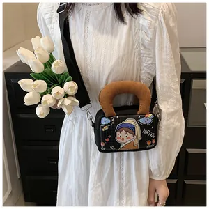Fashionable canvas bag with cartoon art girl print and corduroy handle detail