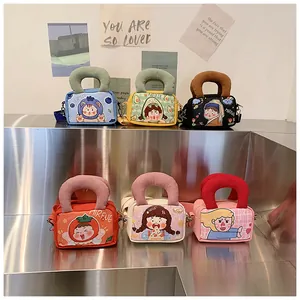 Detail of six colorful canvas crossbody bags with plush handles on a display stand