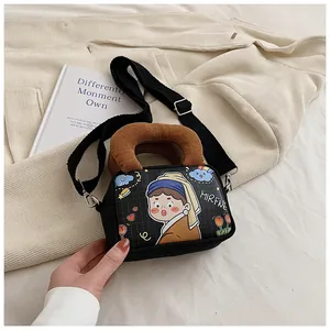 Black canvas crossbody bag with cartoon Girl with a Pearl Earring print and brown handle
