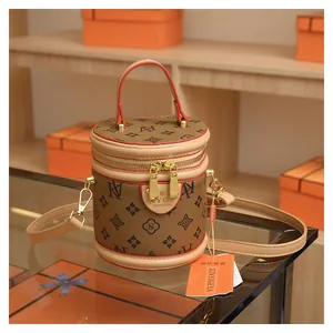 Detailed macro shot of a retro brown monogram bucket bag with high-quality hardware