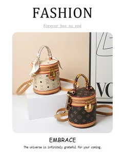 Detail of chic cylinder bucket bags with teddy bear print and classic monogram pattern
