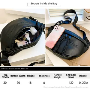 Size chart for black crescent bag showing dimensions and spacious interior capacity