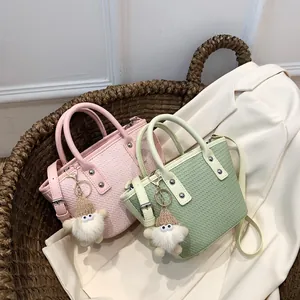 Chic woven texture bucket bags in pink and green with gnome charms and silver studs