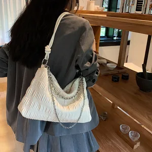 White ruched tote bag with silver chain detail, minimalist fashion shoulder bag for women