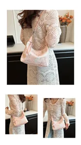 Detail of pink jacquard beaded handbag with traditional Chinese pavilion pattern textures