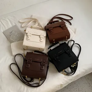 French vintage backpacks in four colors with gold buckles and matte faux leather finish