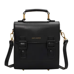 Retro matte black PU leather messenger bag with gold hardware and top handle