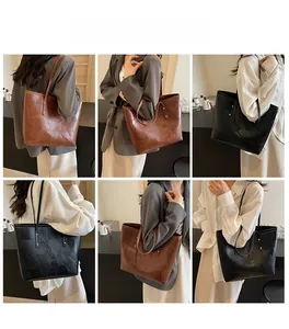 Detailed views of high-capacity tote bags with geometric texture in dark brown and black