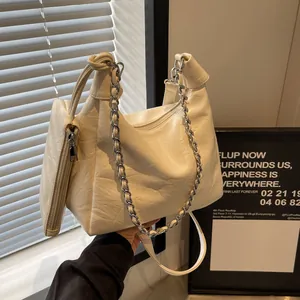 Chic beige pleated hobo bag set with silver chain and matching small coin purse