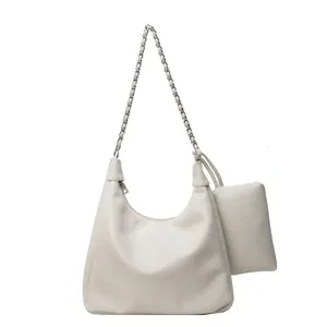 Chic cream white hobo bag with silver chain strap and matching mini pouch accessory