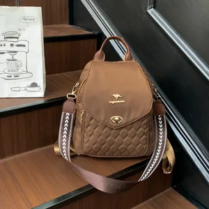 Brown lightweight waterproof nylon backpack with quilted rhombus pattern and wide strap
