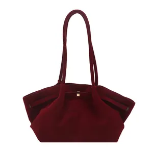 Large burgundy velvet tote bag with vintage matte finish and gold metal buckle detail